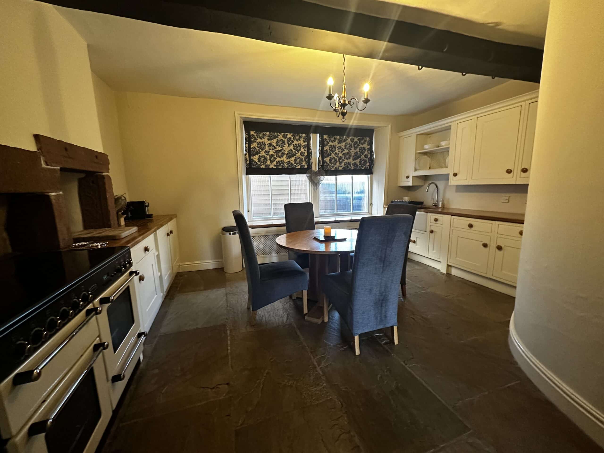 Fully fitted kitchen with range cooker